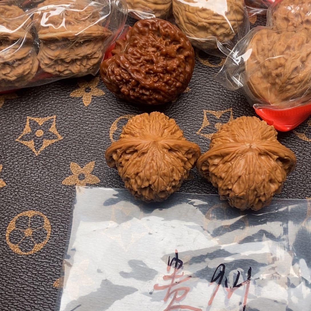 贵***司文玩核桃吊坠磨盘