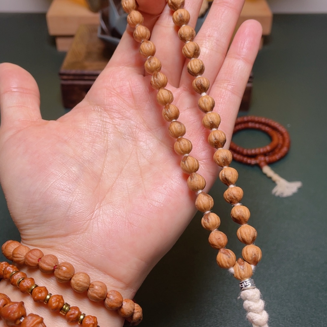 吊坠柏香籽/百香籽莲花手持红牙口