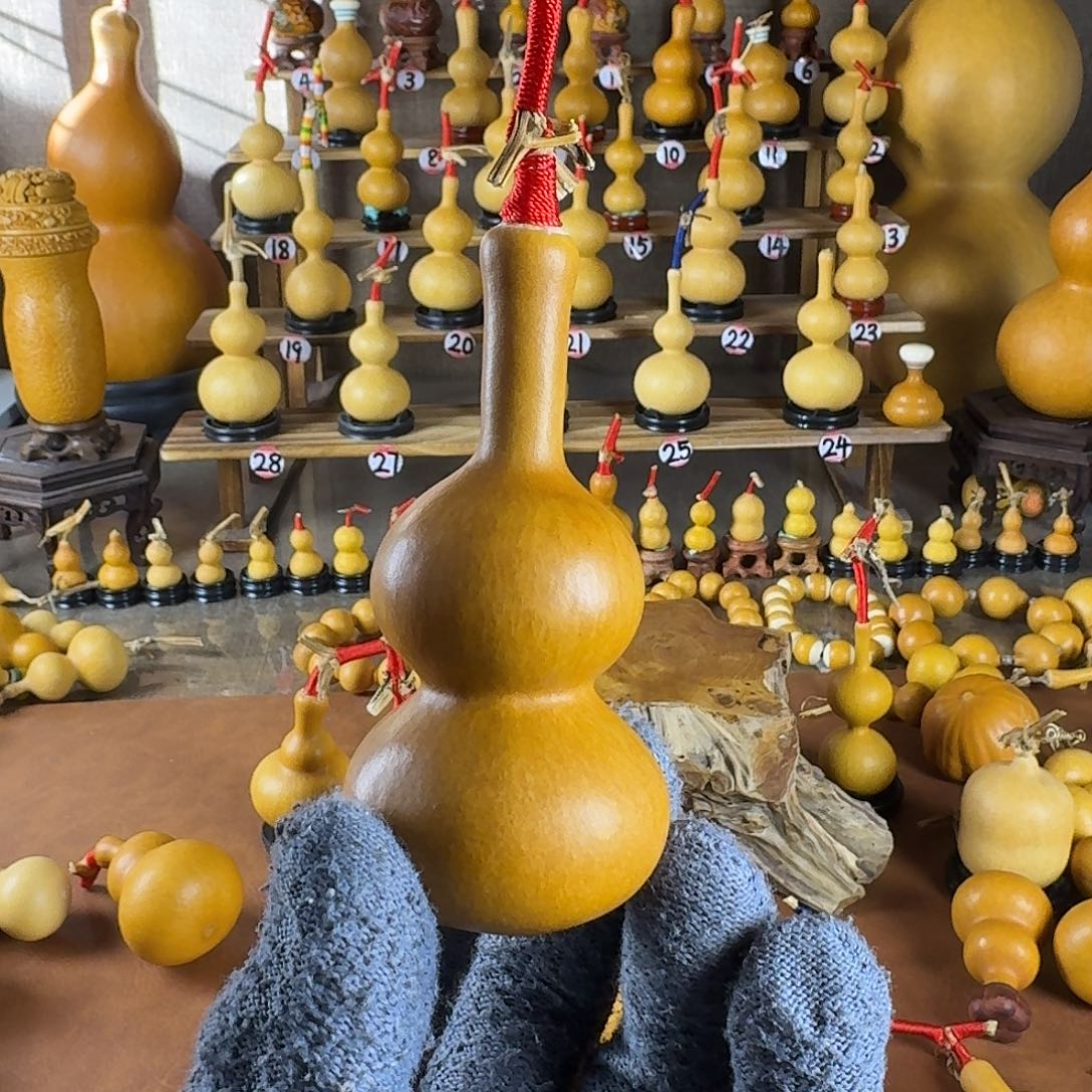 稚***脱聚缘葫芦工艺品店