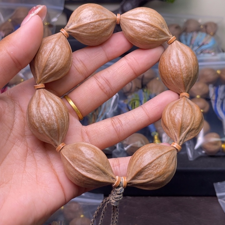 刘***店手串/手链橄榄核橄榄核2.4四花200