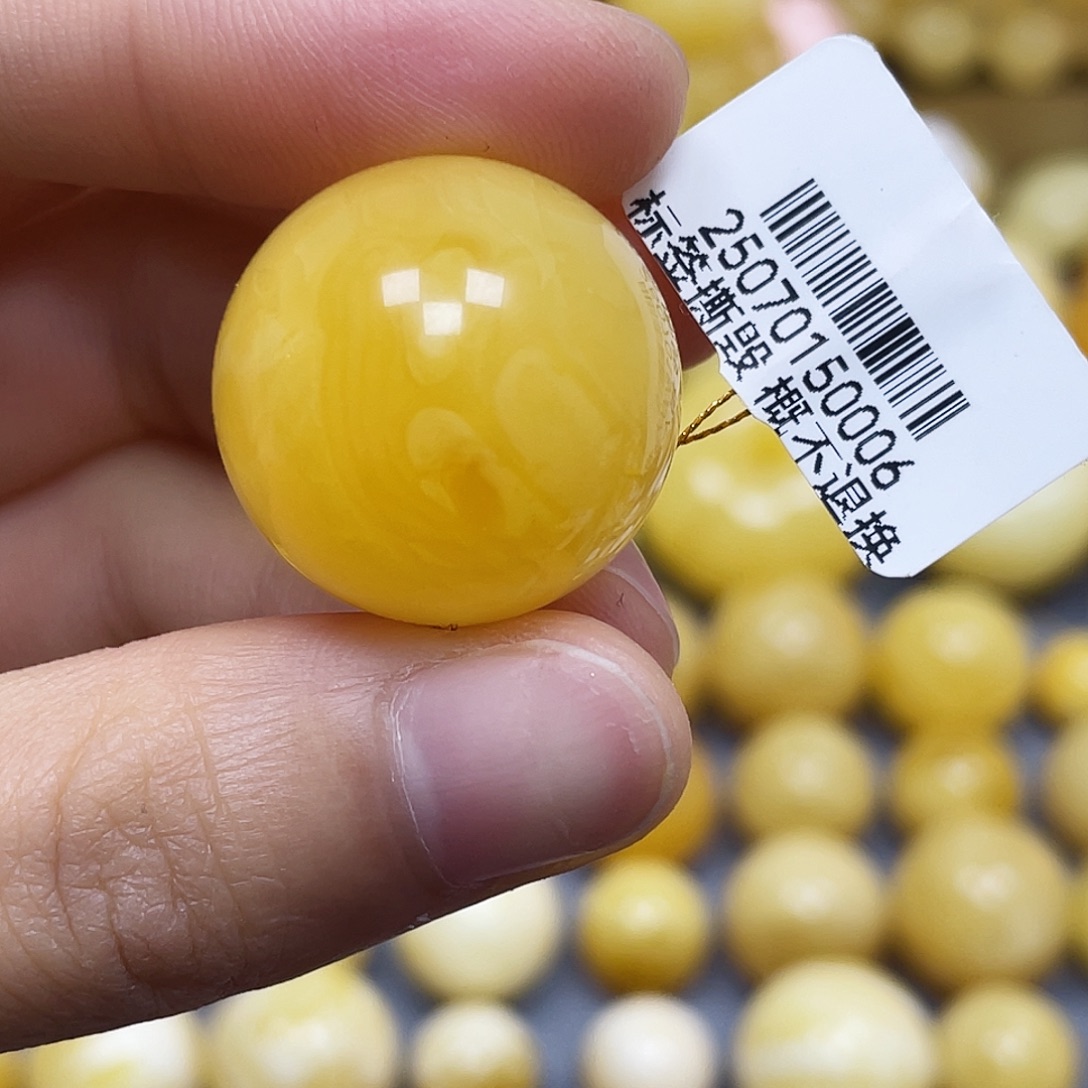 蜜蜡未镶嵌裸石22.7mm.瑕