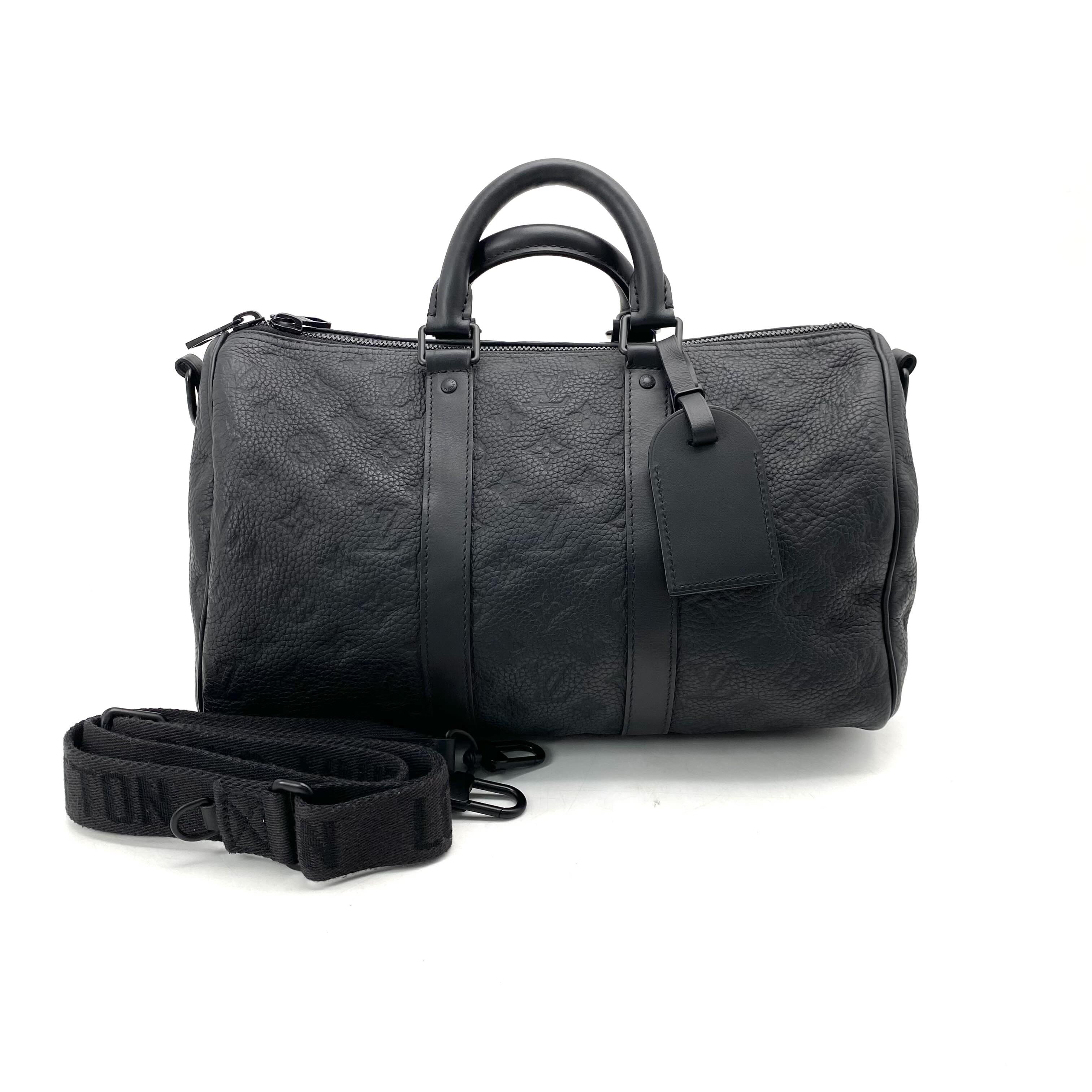 99新 LouisVuitton/路易威登 黑色压花休闲keepall35斜挎包 34/21