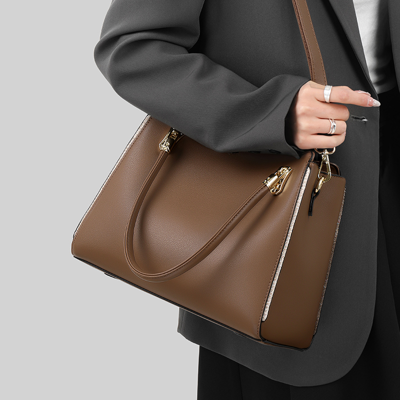 女士包包手提2025新款韩版大气简约百搭中年妈妈包通勒斜挎包