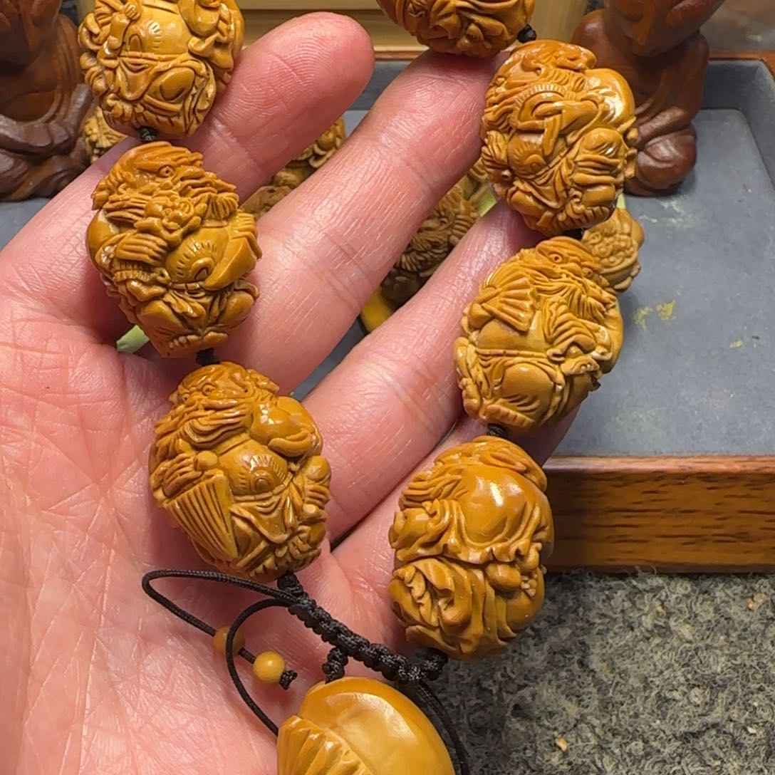 橄榄核吊坠哦****?……………………