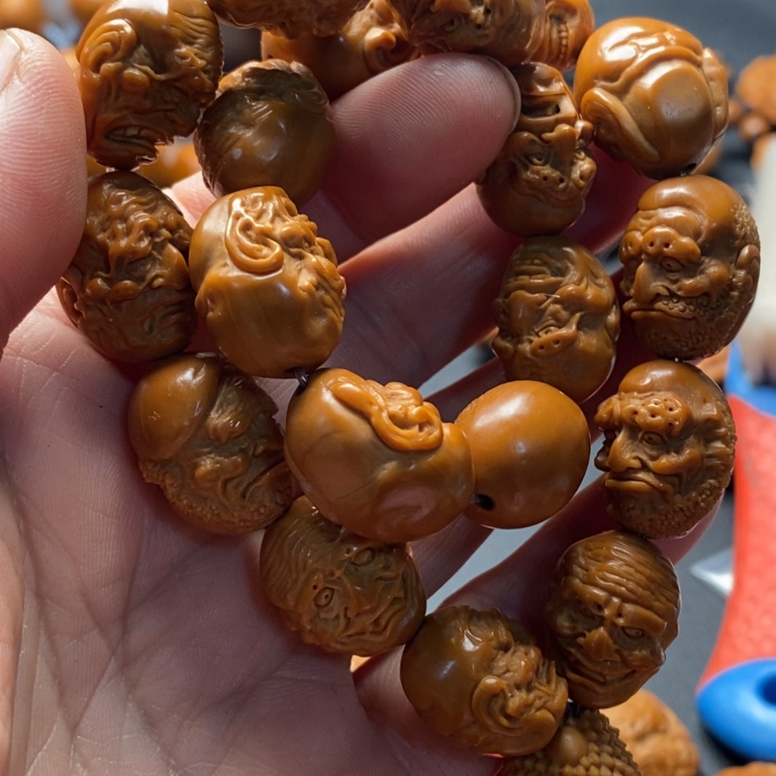 吊坠橄榄核飞***。橄榄核