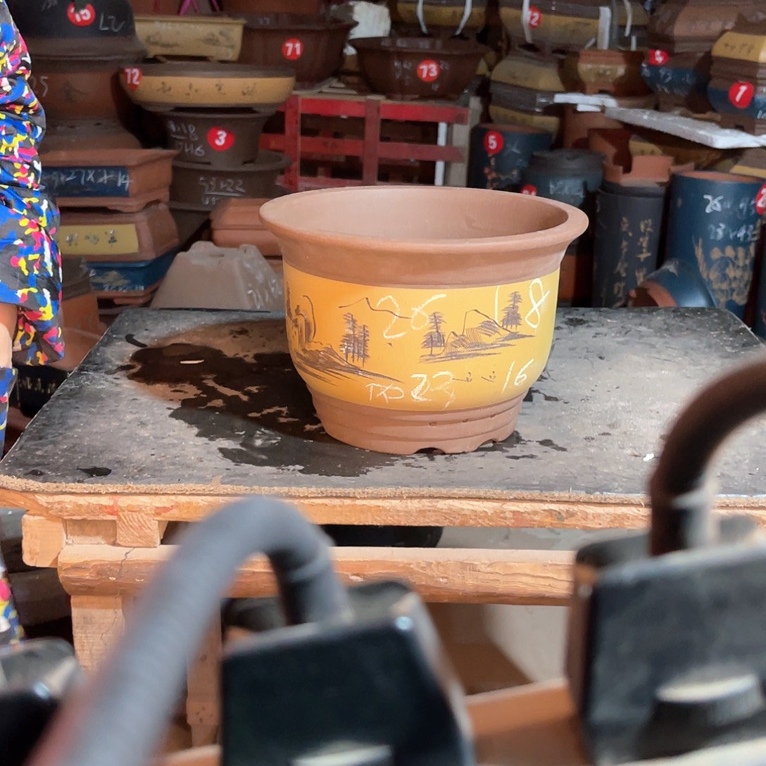 紫砂花盆金钟一个