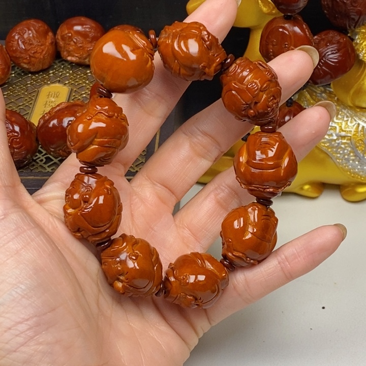 橄榄核吊坠长**红橄榄核手串