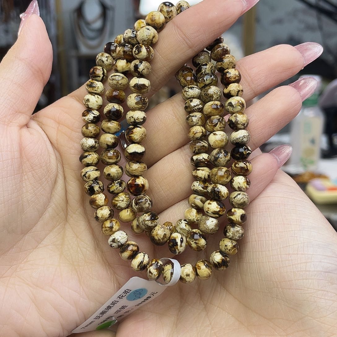 琥珀裸石未镶嵌泡****吃抚顺琥珀7+干白花