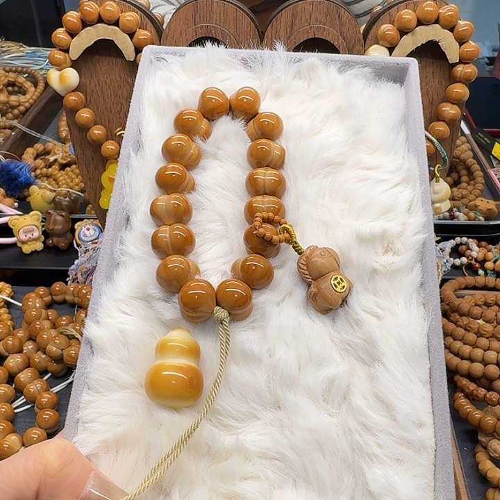 漫***。猴头核桃吊坠猴头屁桃