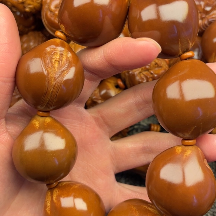 橄榄核吊坠尪**琞橄榄核