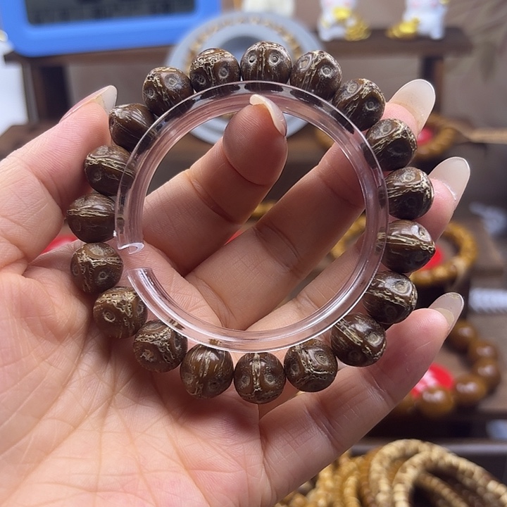 ?***长紫金鼠原皮籽手串