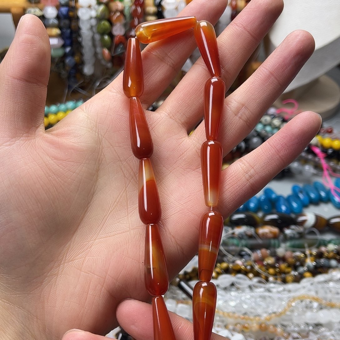 玛瑙/玉髓未镶嵌珠宝半成品10×30红玛水滴一条