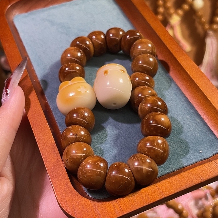 邵****猴头核桃吊坠库克蒜瓣大肠蜜罐