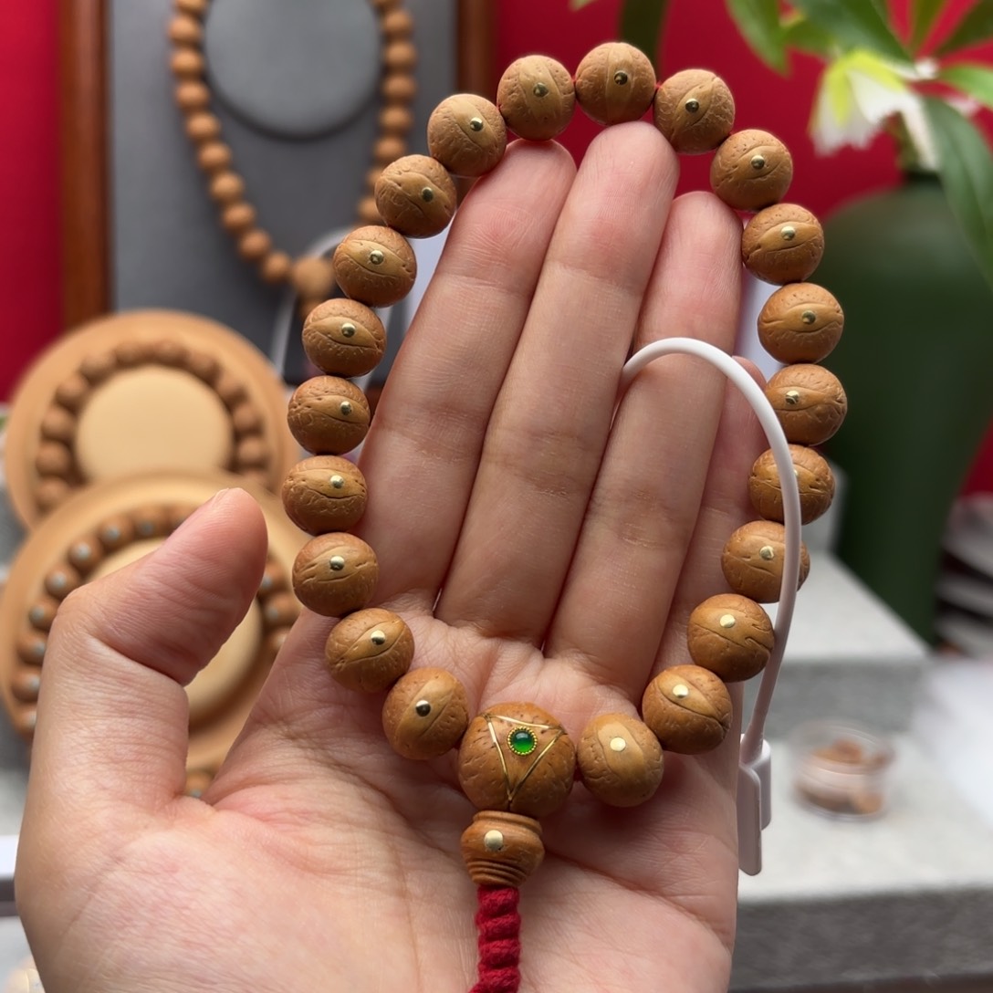 凤眼菩提手串12.5左右铜钉镶嵌手串