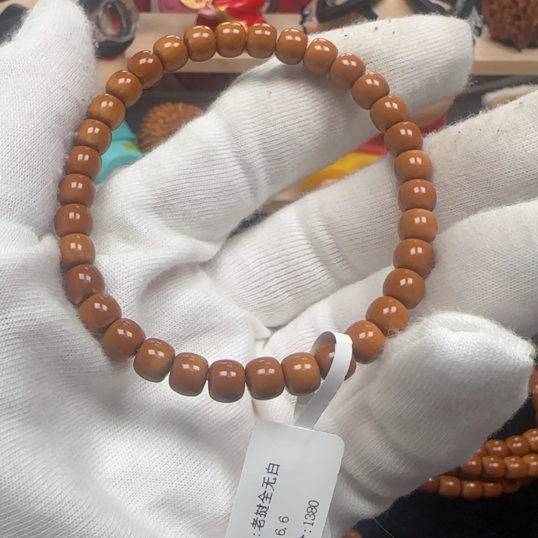 手串橄榄核老挝单圈极限弧6.6mm