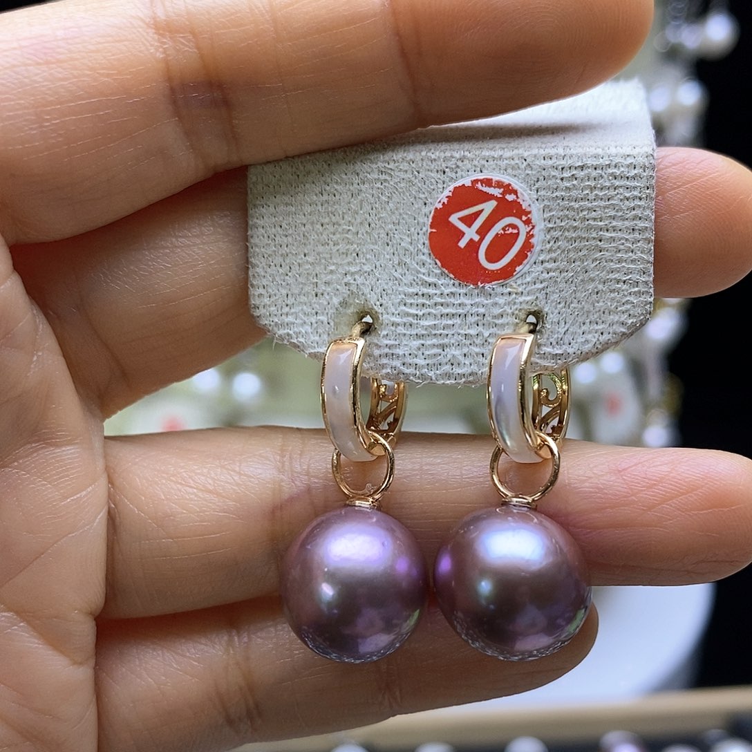 淡水珍珠耳饰银S925镶嵌一****肉