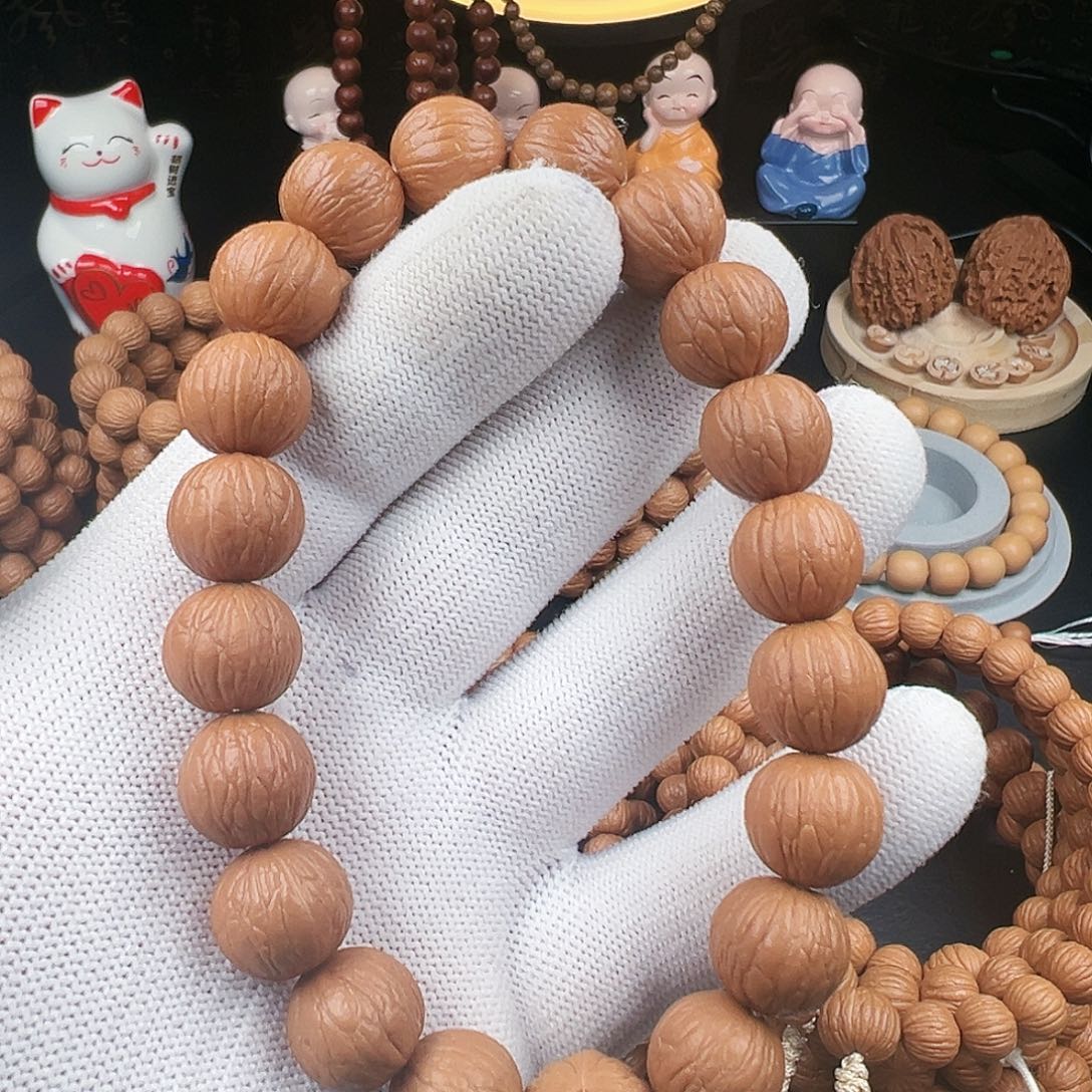 自***渡猴头核桃手串聚宝盆