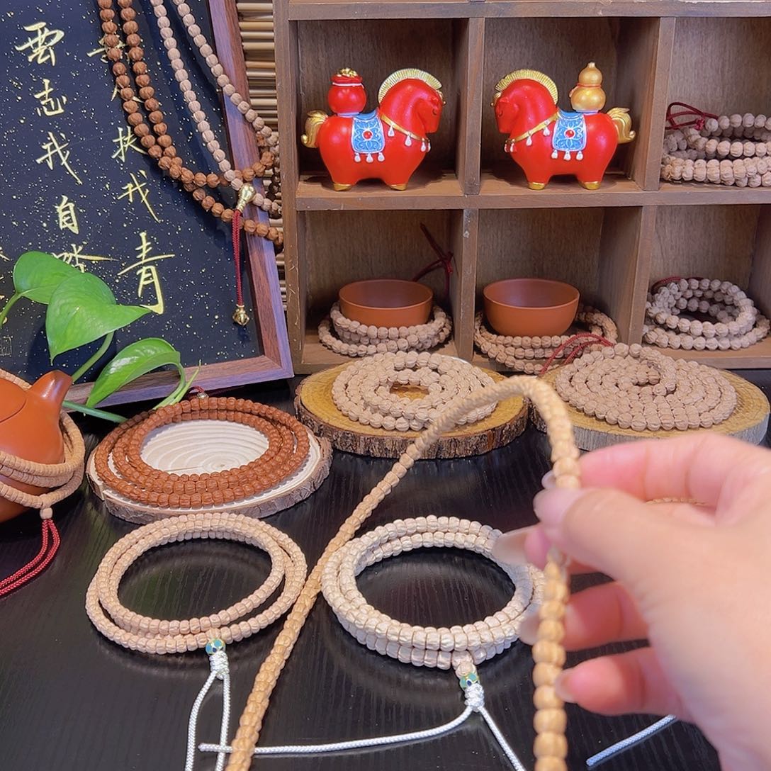 倪***光柏香籽/百香籽吊坠