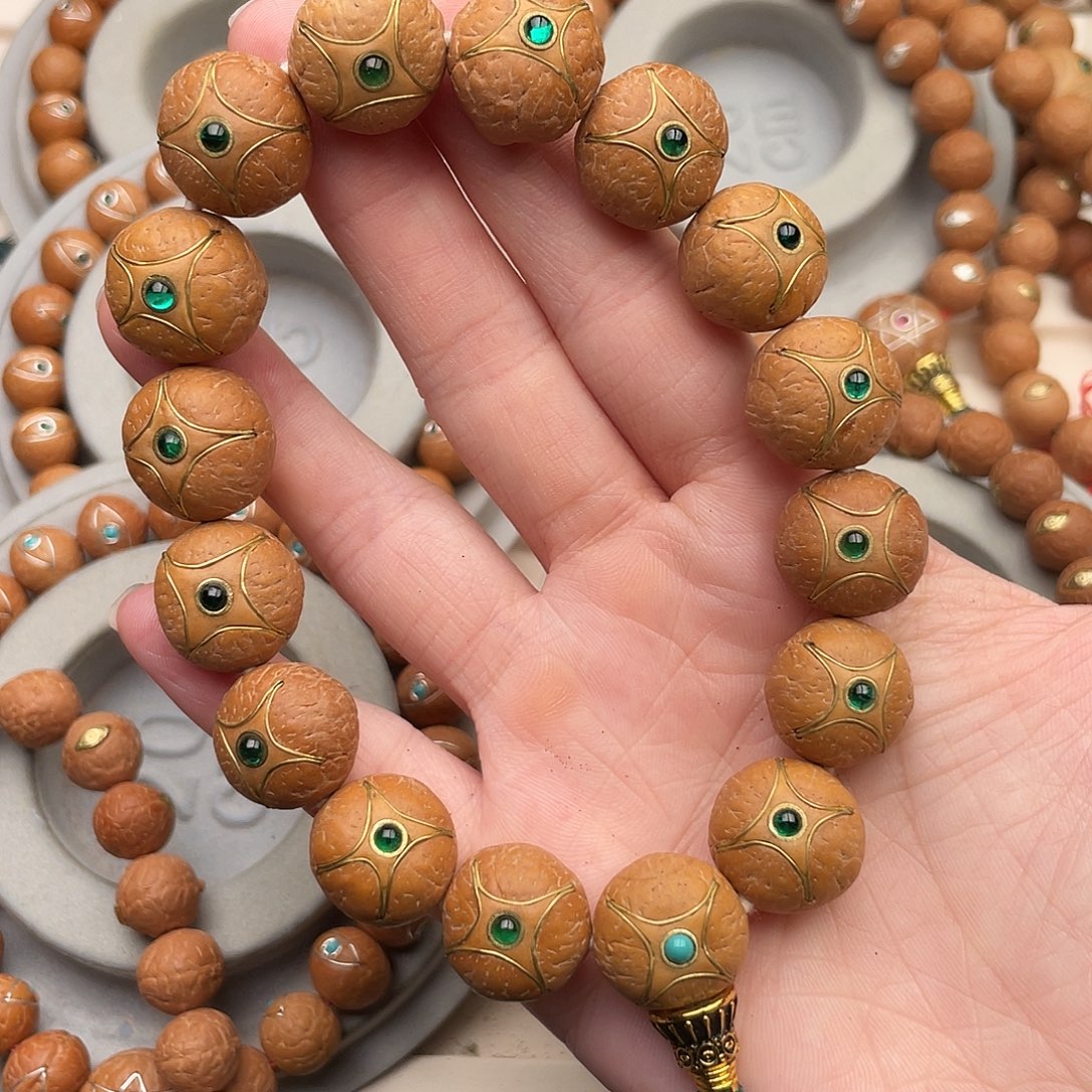 K***-凤眼菩提吊坠紫金