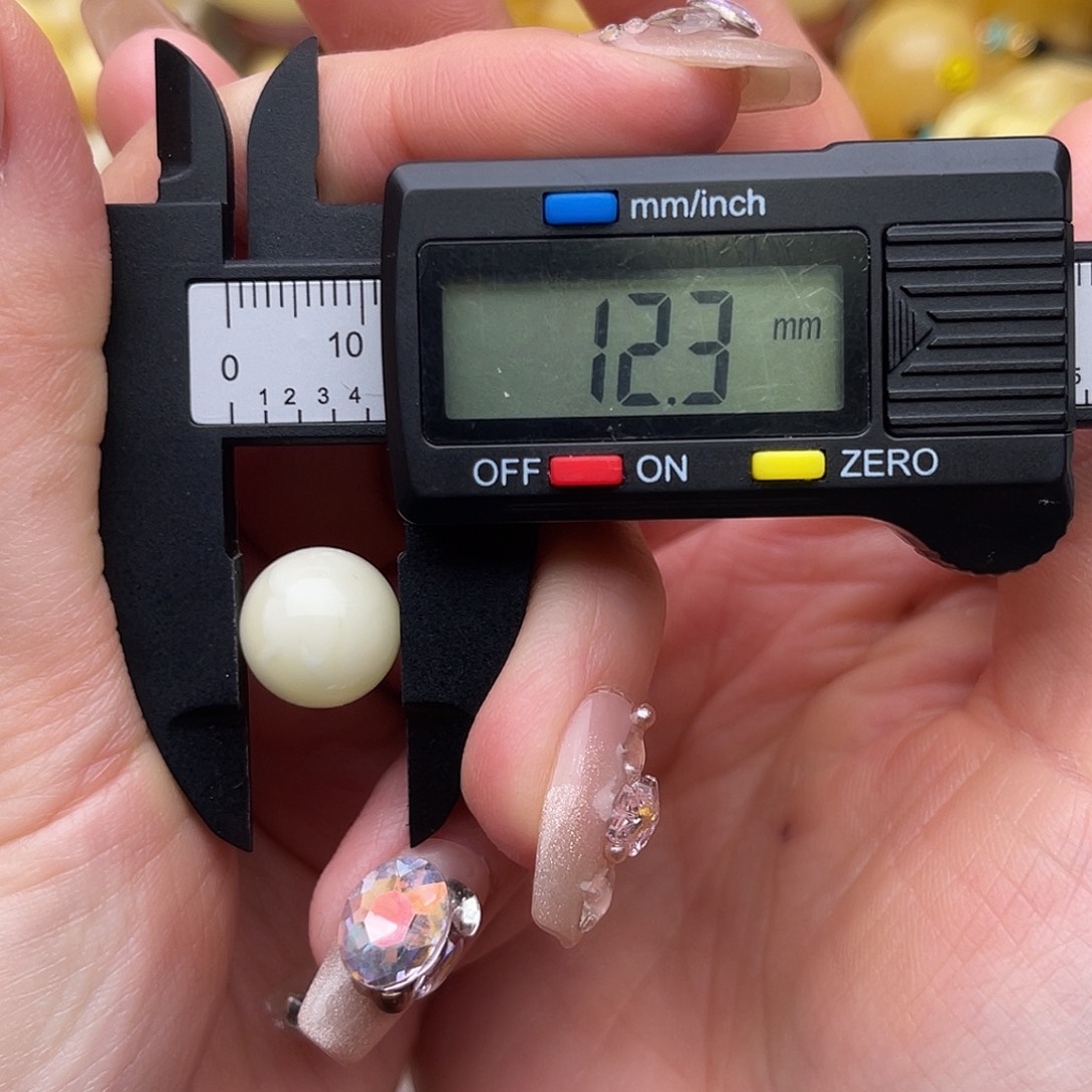 超***-琥珀未镶嵌裸石蜜蜡圆珠鸽