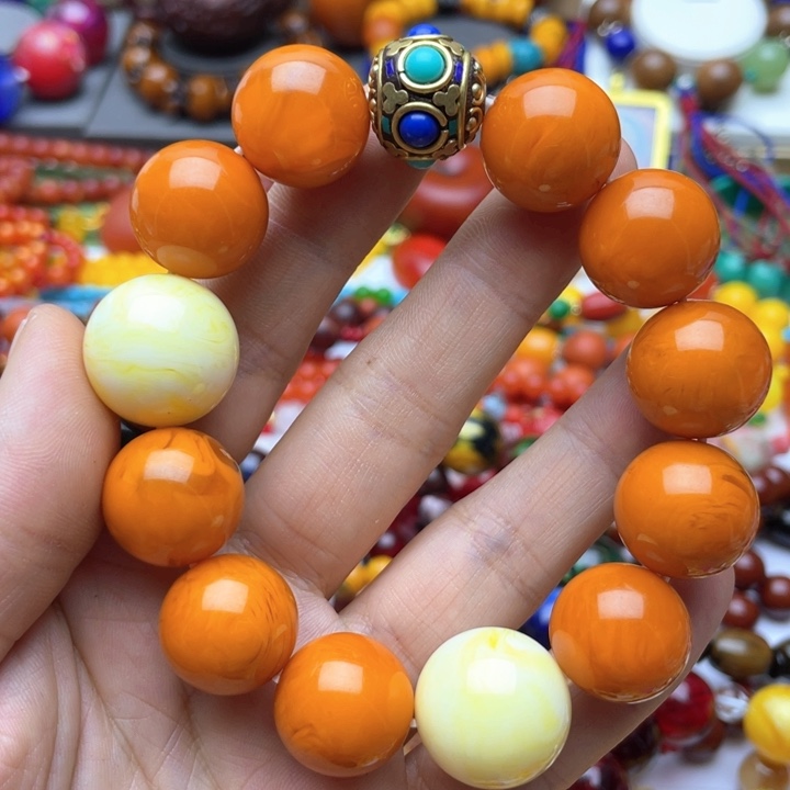 树脂制品44号橘色手串