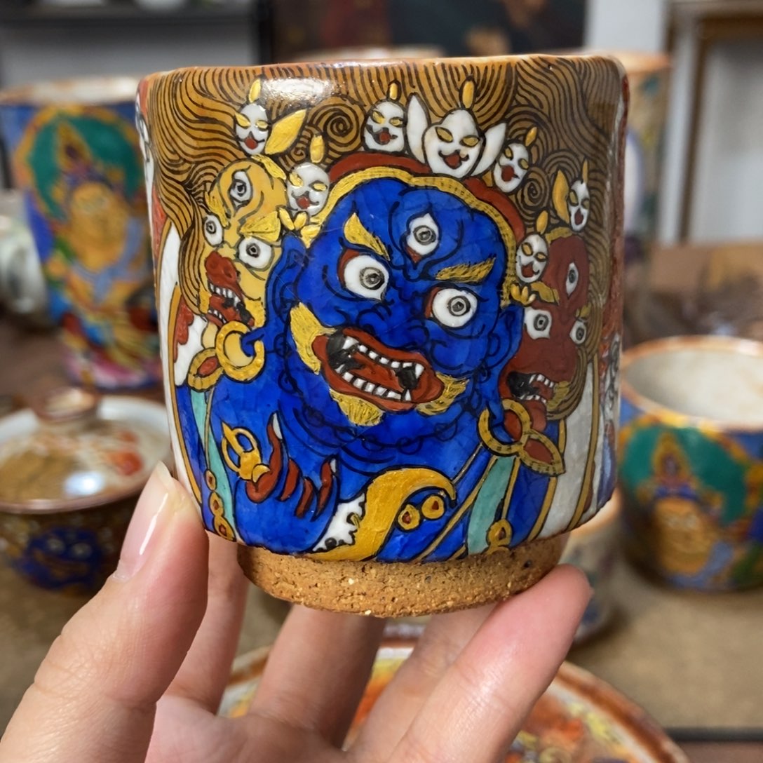 手工绘画大黑天杯子