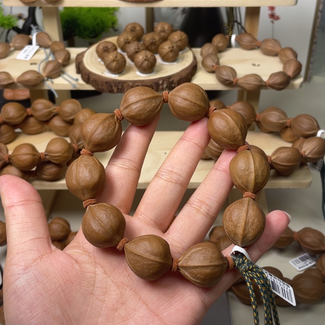 司***落手串/手链橄榄核21*26梅林铁核