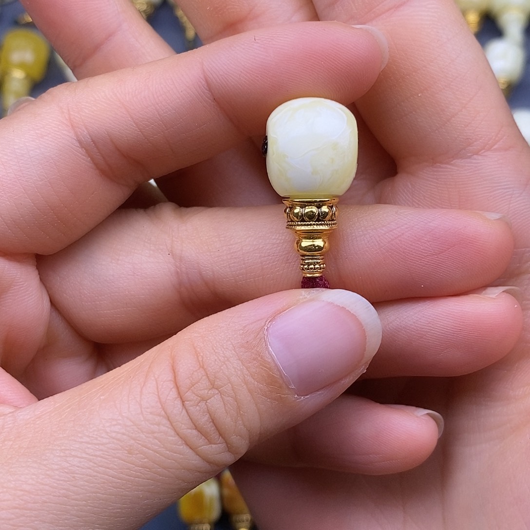 阿***布琥珀18K金镶嵌裸石13mm 蜜蜡三通