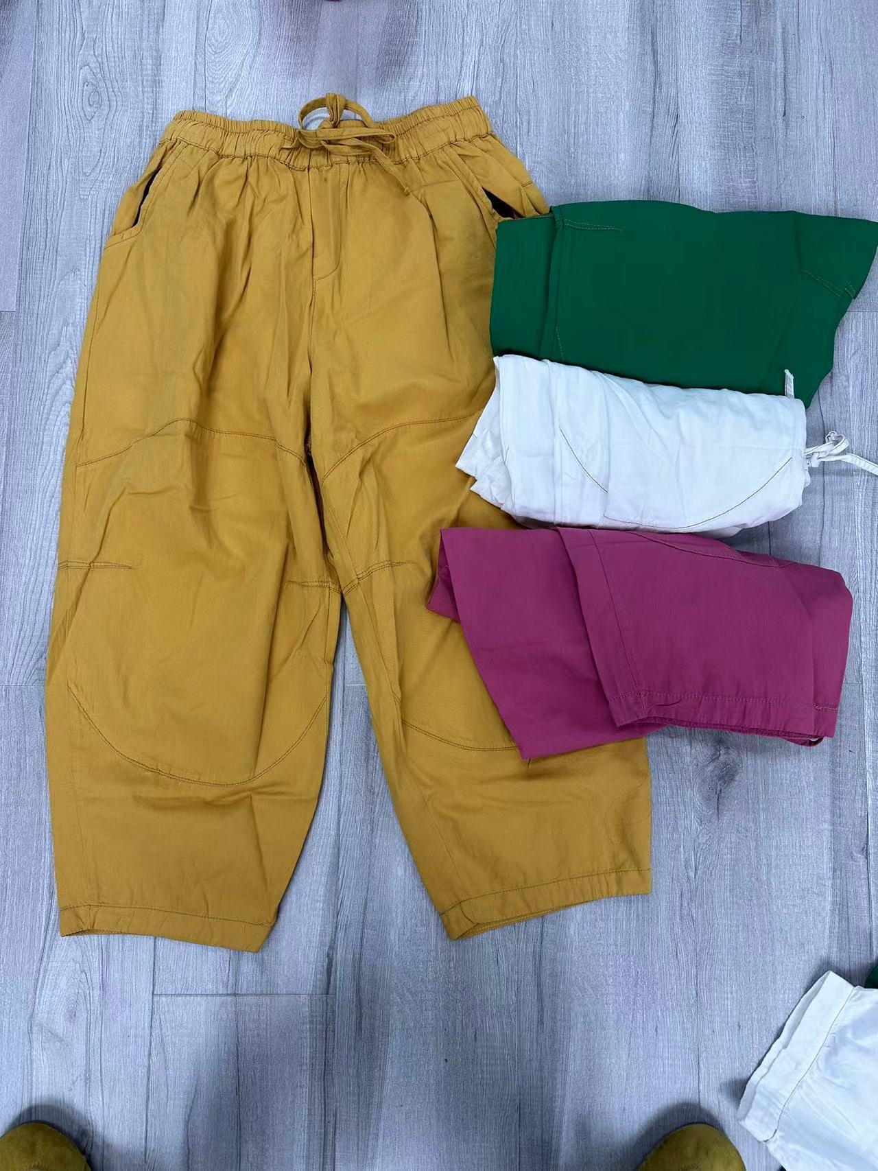 HY    808净色膝盖分割线捏皱裤