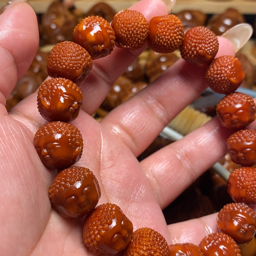 【闪购商品】橄榄核吊坠骑*龙宝宝佛串