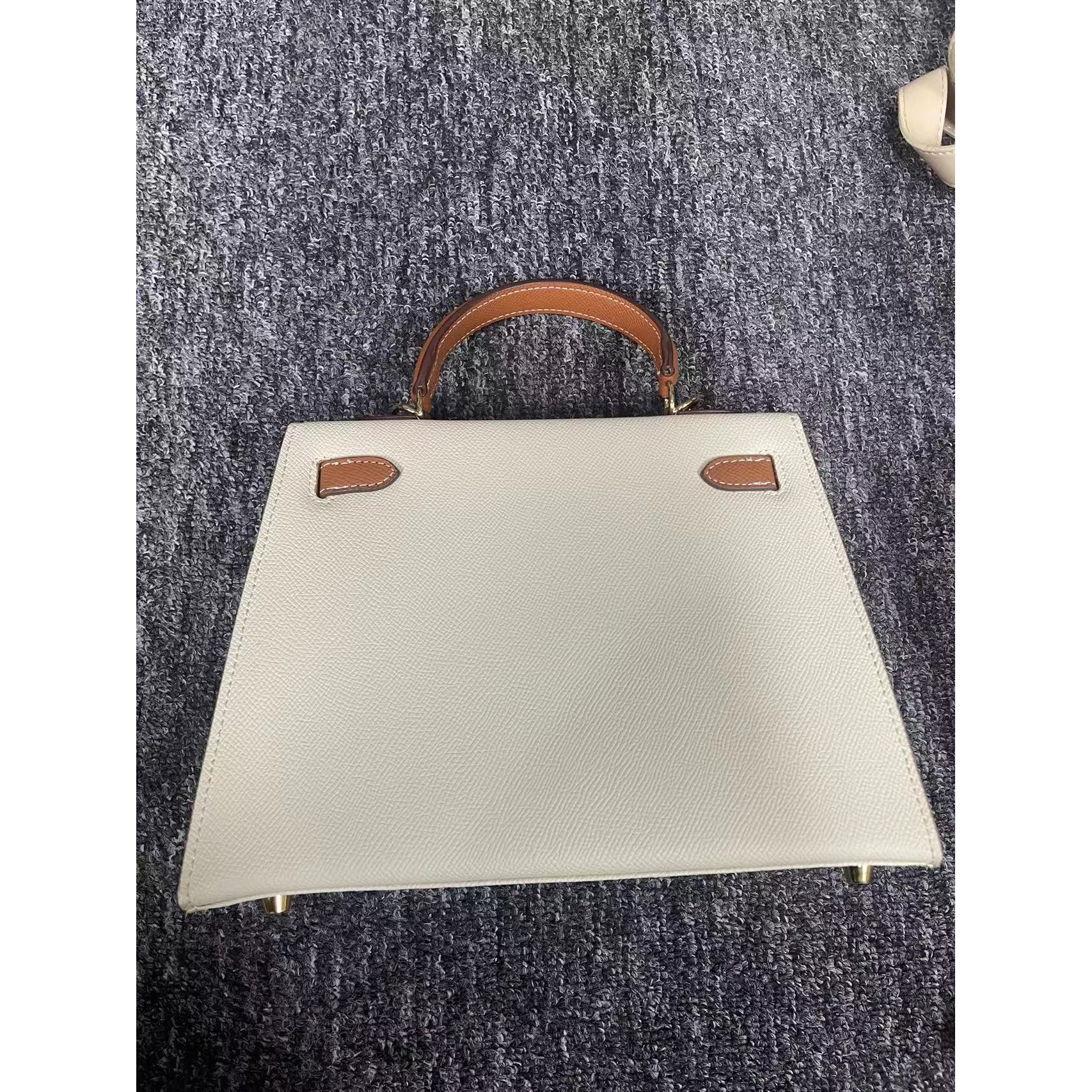 姝宴真皮女包手提白棕