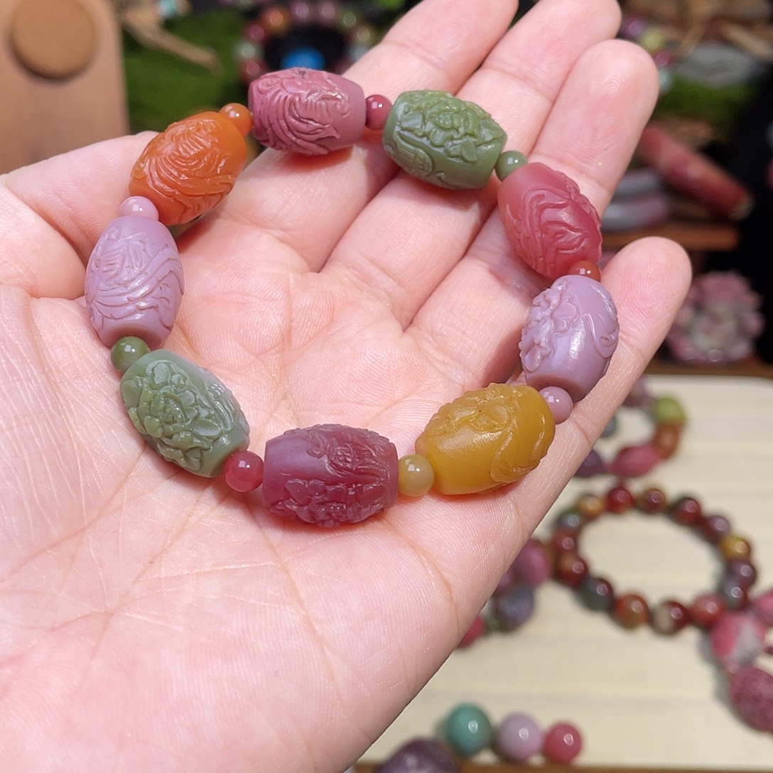 苑***天玛瑙/玉髓未镶嵌手链盐源玛瑙炫彩凤穿牡丹桶珠