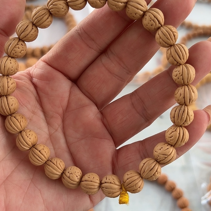 文玩核桃手串野生小桃核手串。