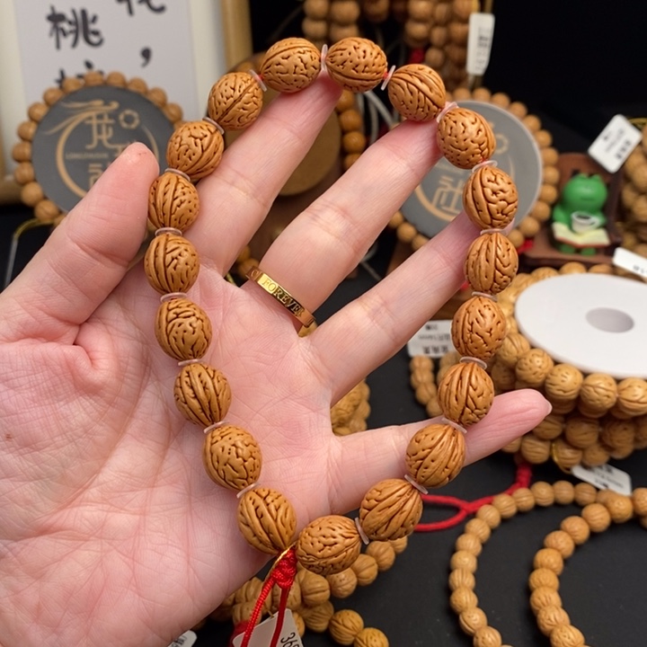 桃核手串钱袋花脐手持边尺12.5抛光尺寸误差0.5mm之间