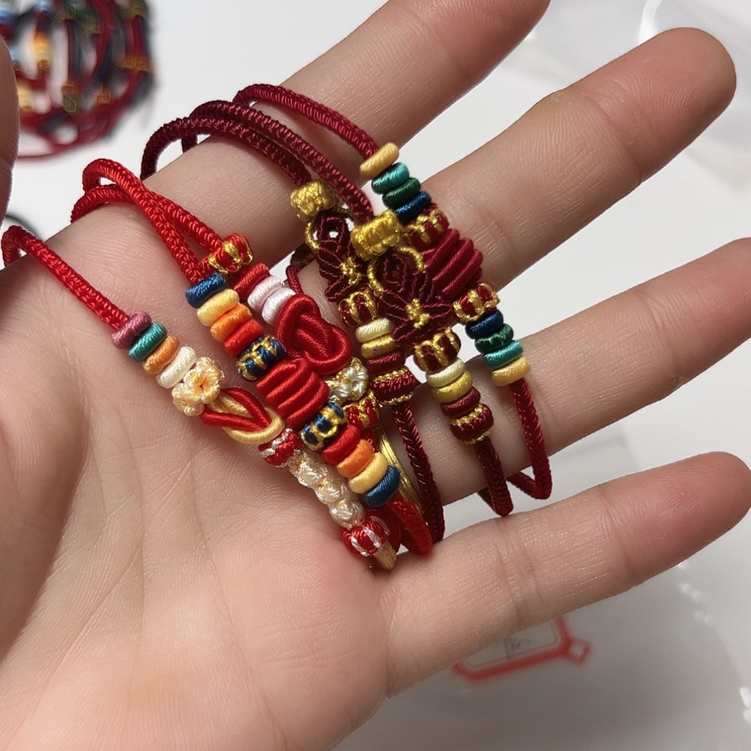 瑞***雪无纺布手工编织红绳混搭