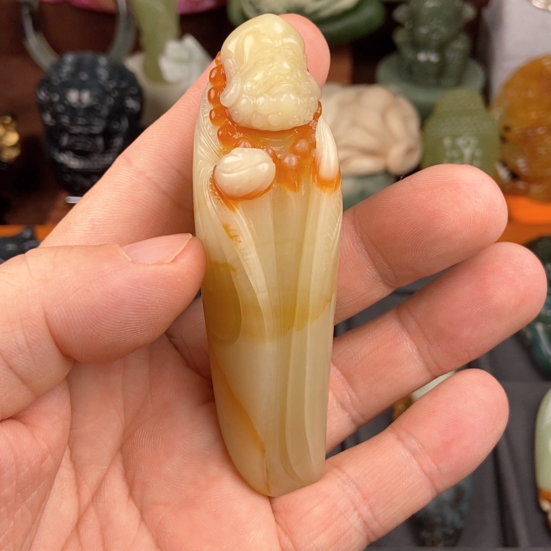 岫玉手把件未镶嵌麒**哥