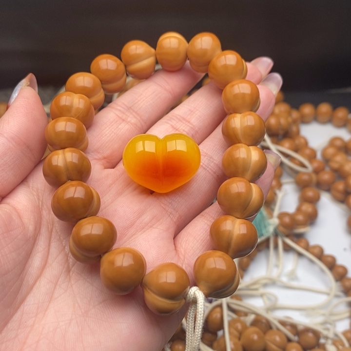 金***豆猴头核桃手串屁桃