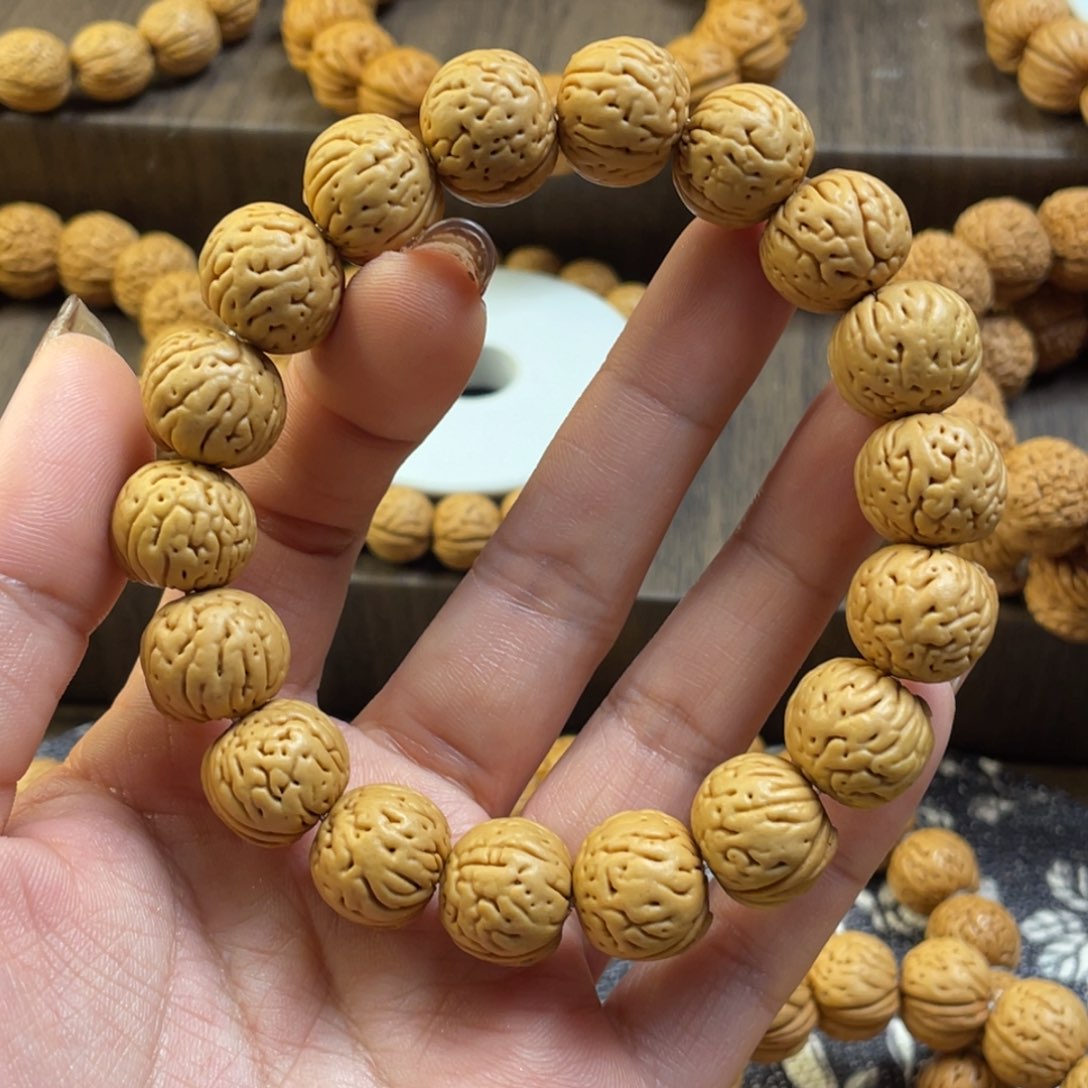 桃核手串王*发肉纹元宝