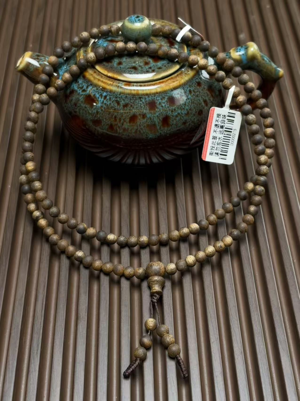 沉香海南奇楠黄油格 0.5 圆珠多圈091