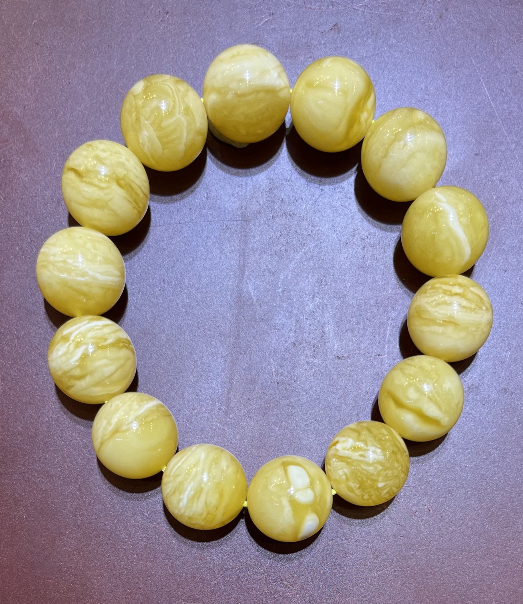 琥珀俄白花虎皮纹圆珠手串，14m+，25.34g、天然原矿保真