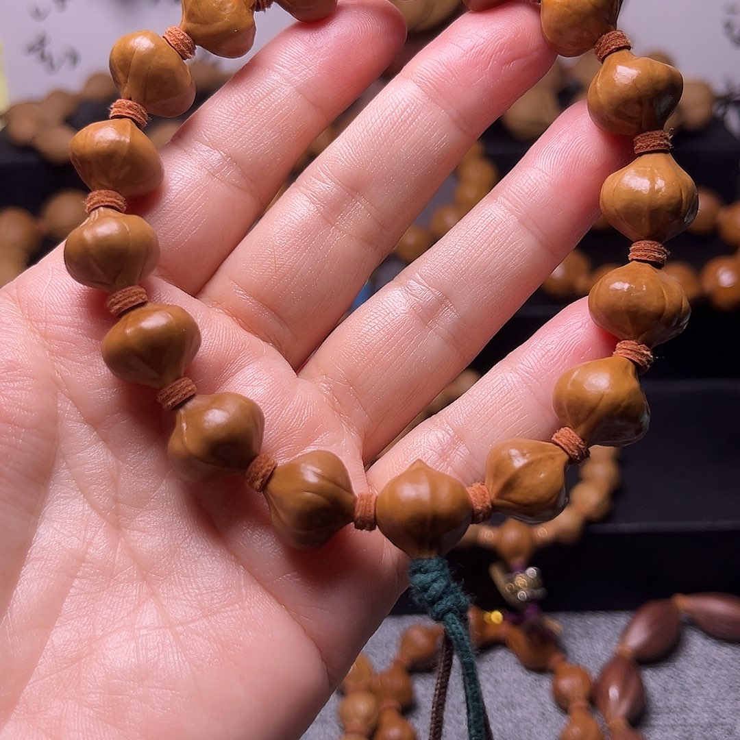 开***差手串橄榄核梅林蒜头14.12