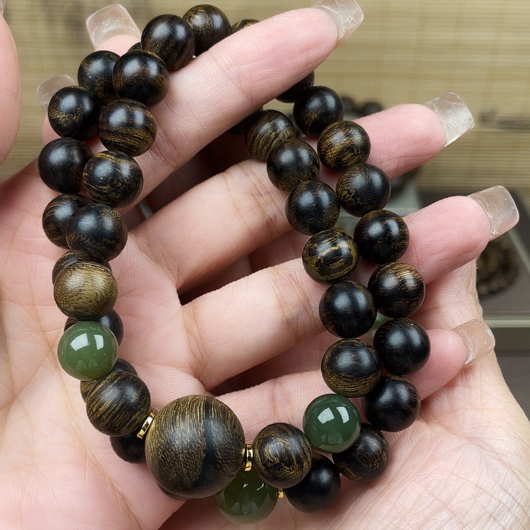 玄***人沉香手串越南芽庄白奇玉化留疤