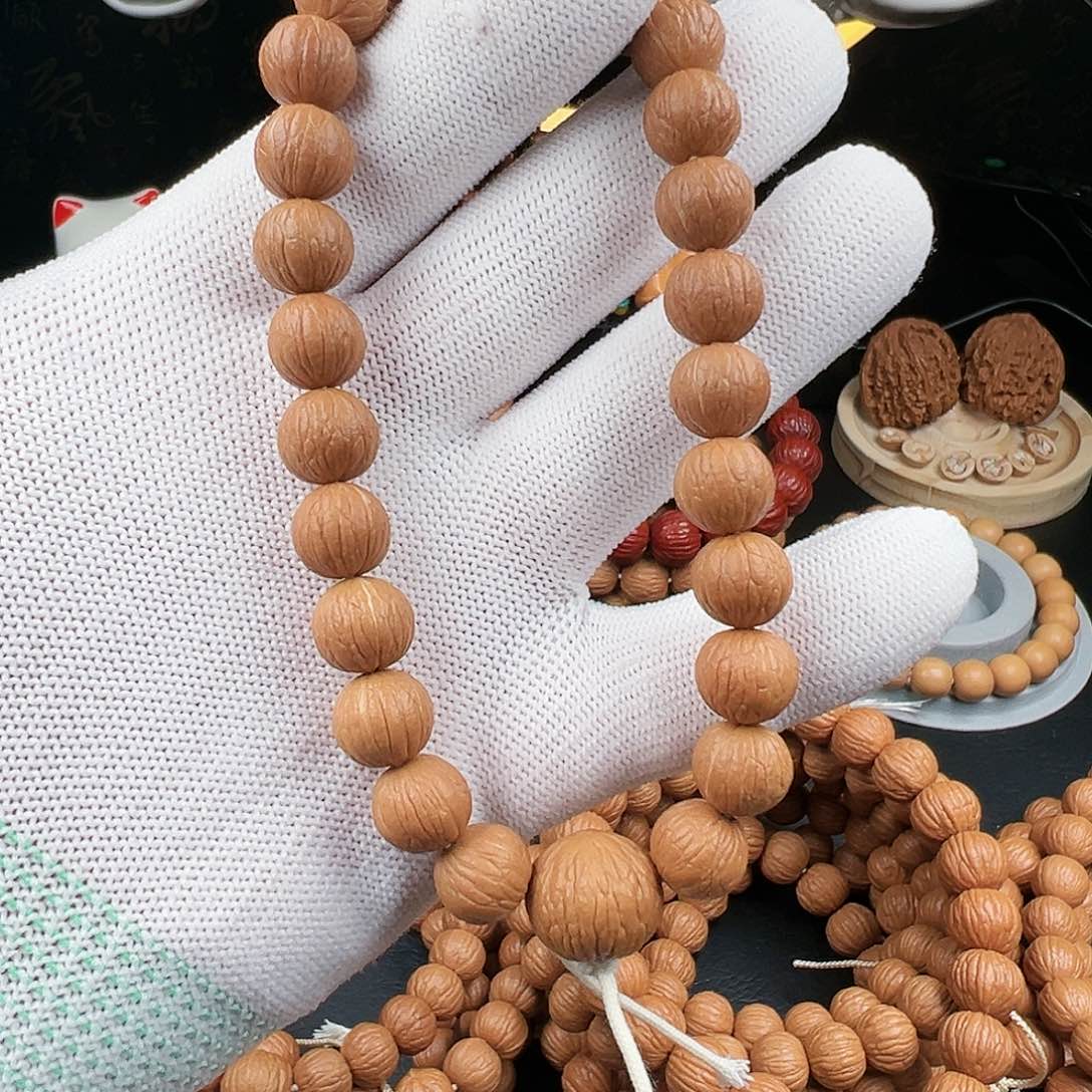 简***好猴头核桃手串凤羽