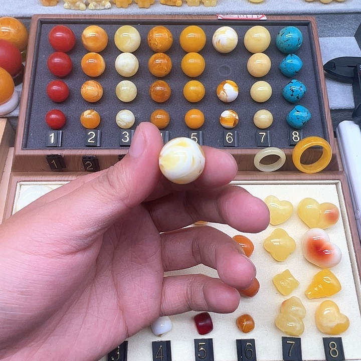 琥珀未镶嵌裸石黄白妖花单珠