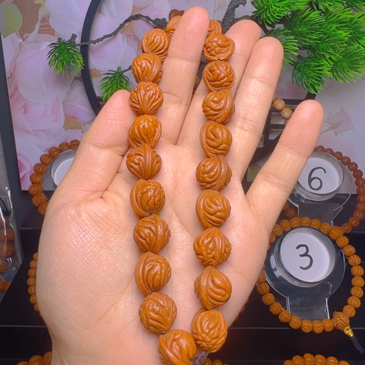 ヤ***の桃核吊坠龙纹桃核手串