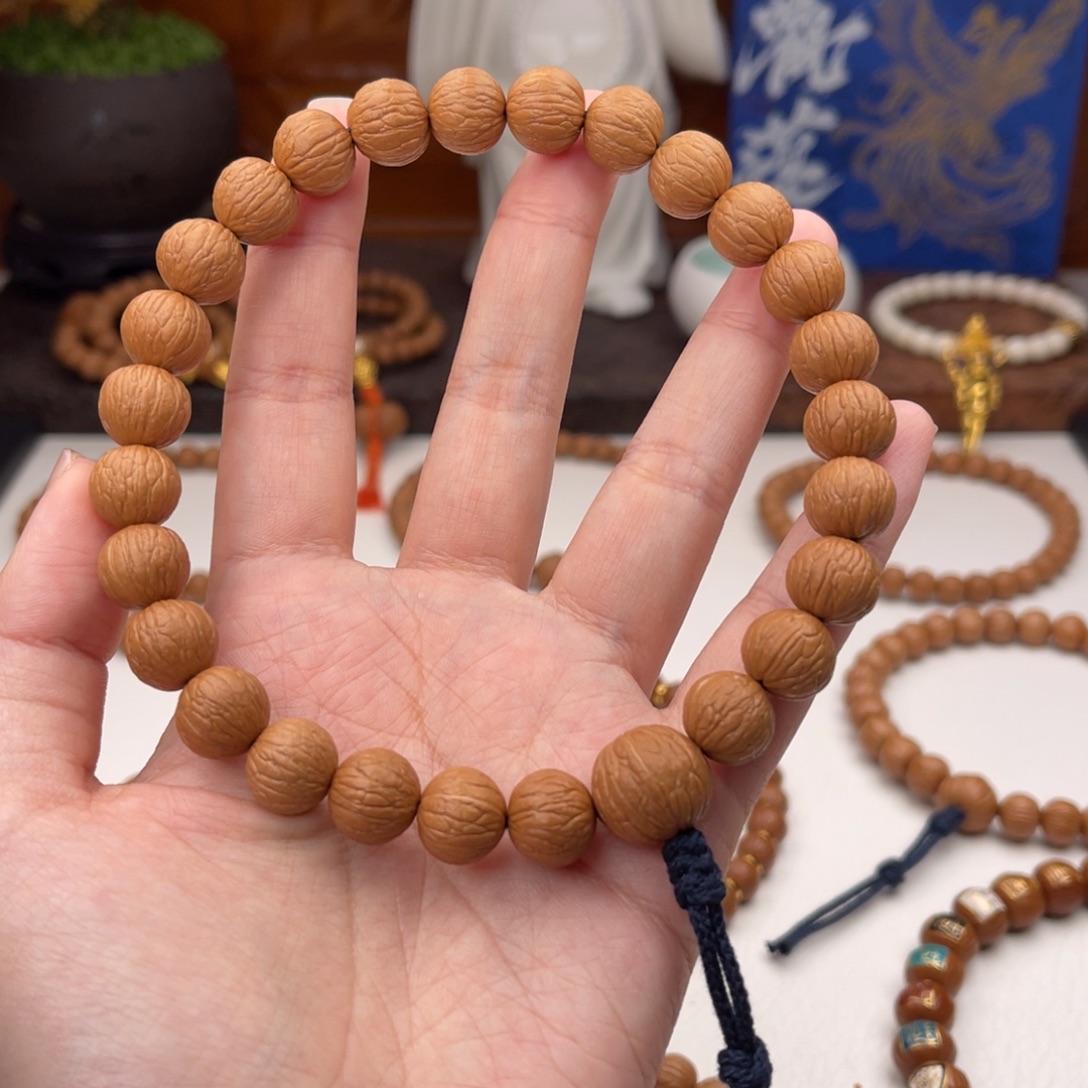 W***.猴头核桃吊坠凤羽12