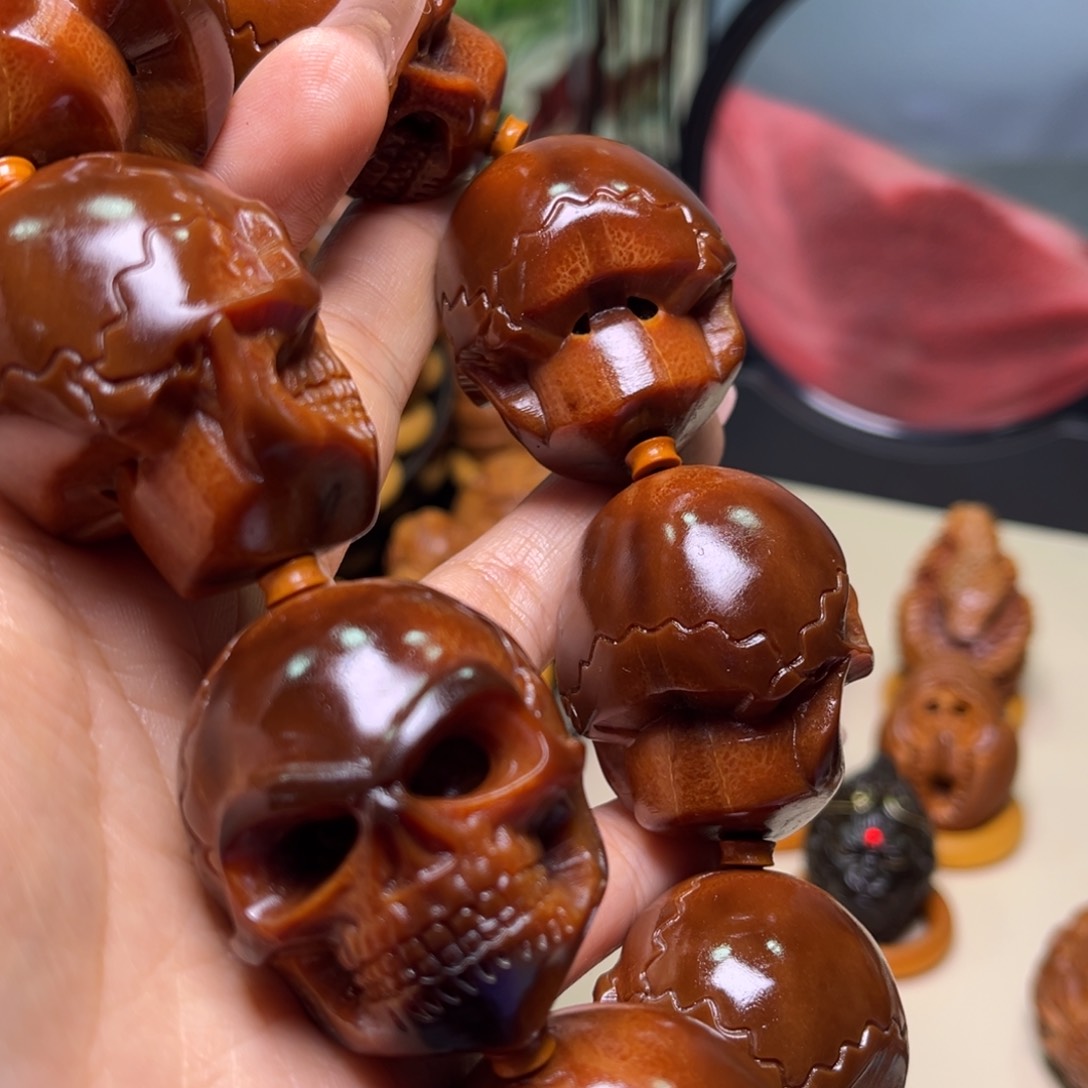 橄榄核手串/手链饭***酒玉化骷髅手持一条