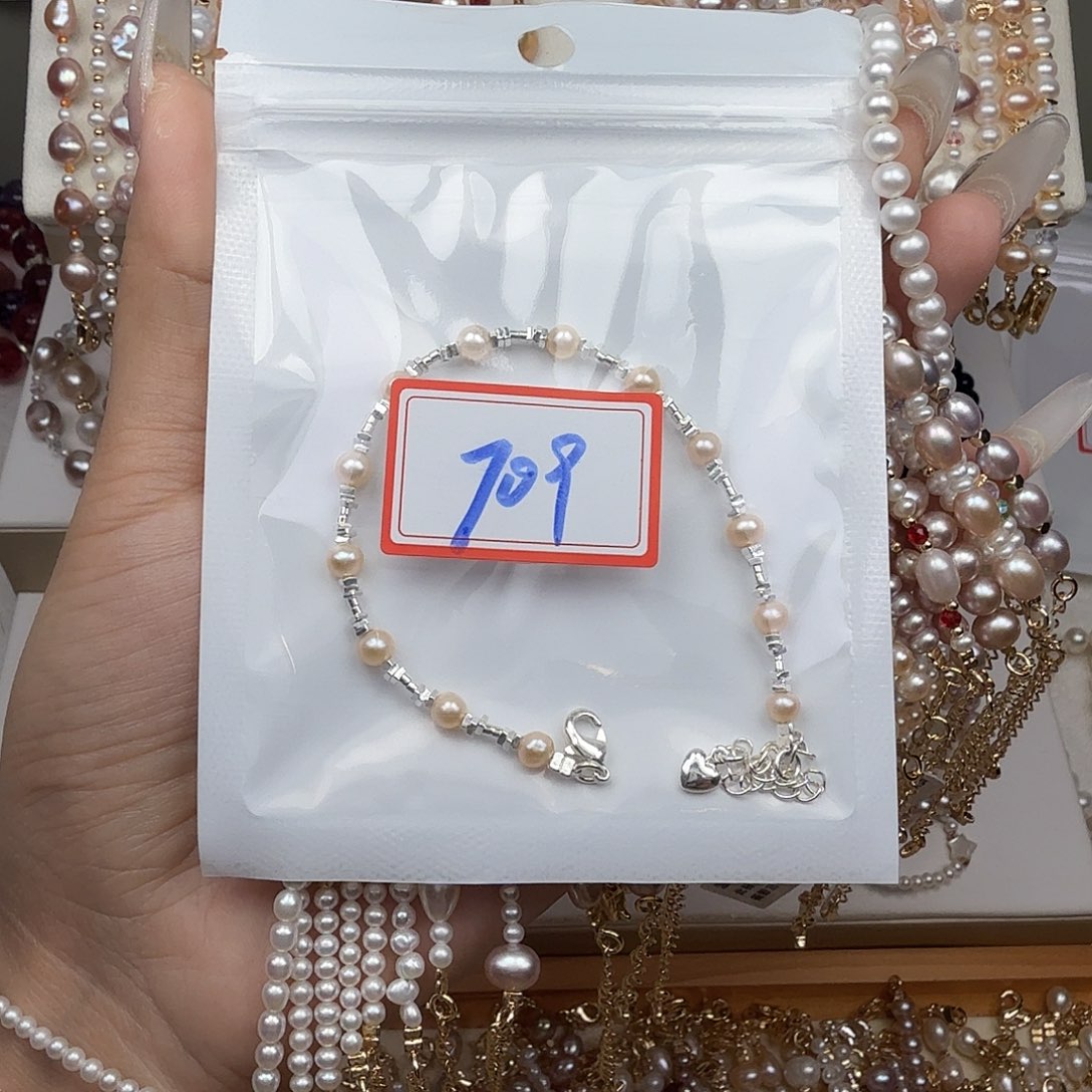 靓****钛钢手绳淡水珍珠
