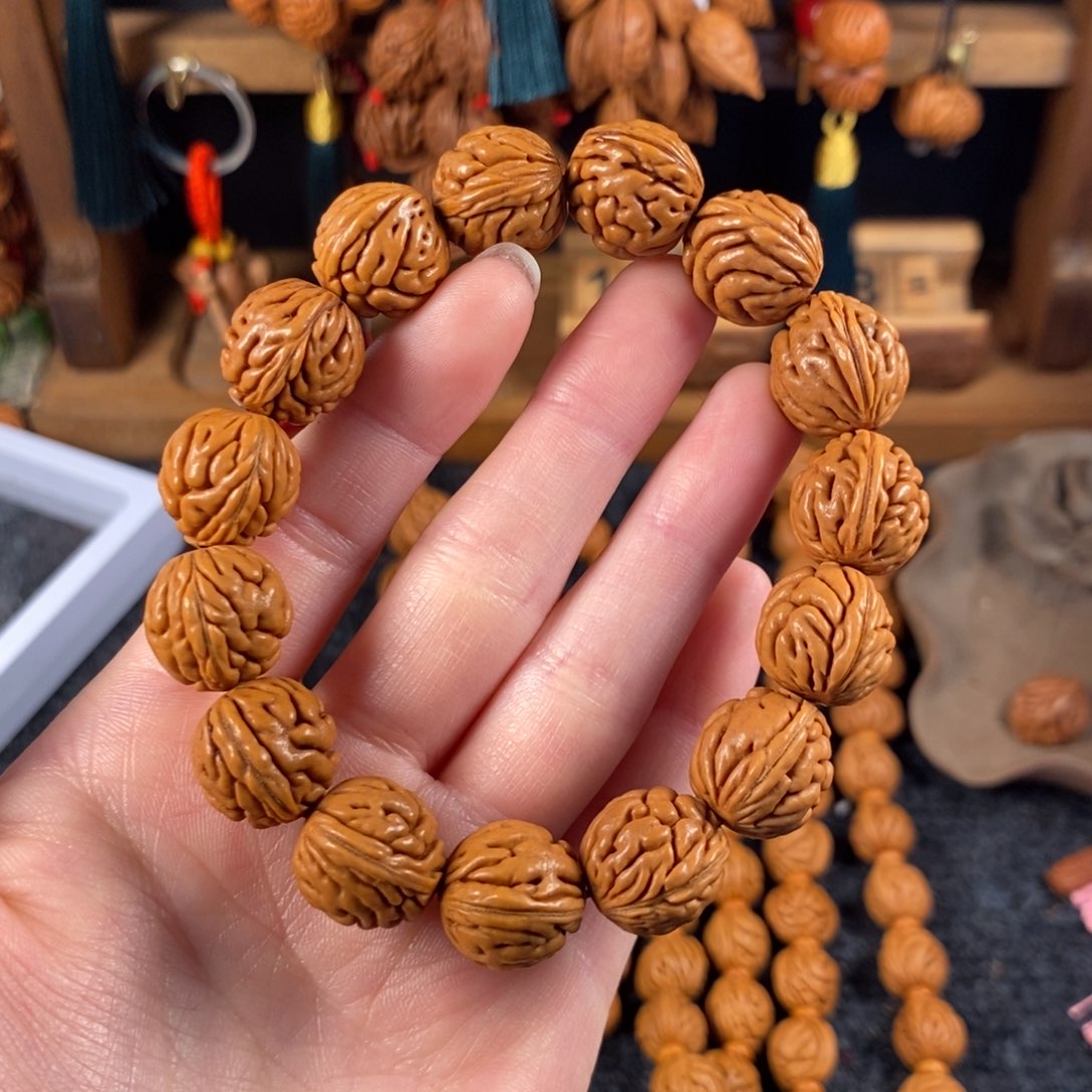 吊坠桃核桃枭手串