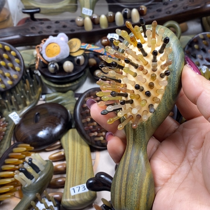 不***花绿檀65齿羊角气垫梳